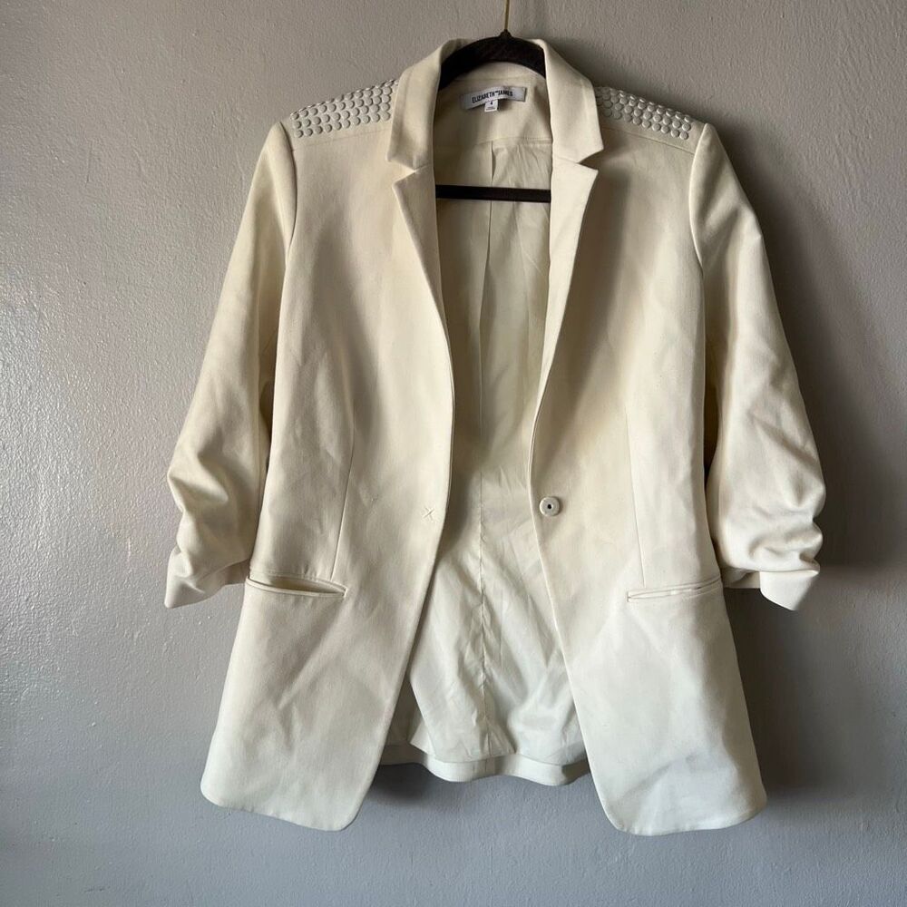 Elizabeth and James blazer features studded details on the shoulders